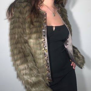 Faux fur covered jacket with jewel embellishments